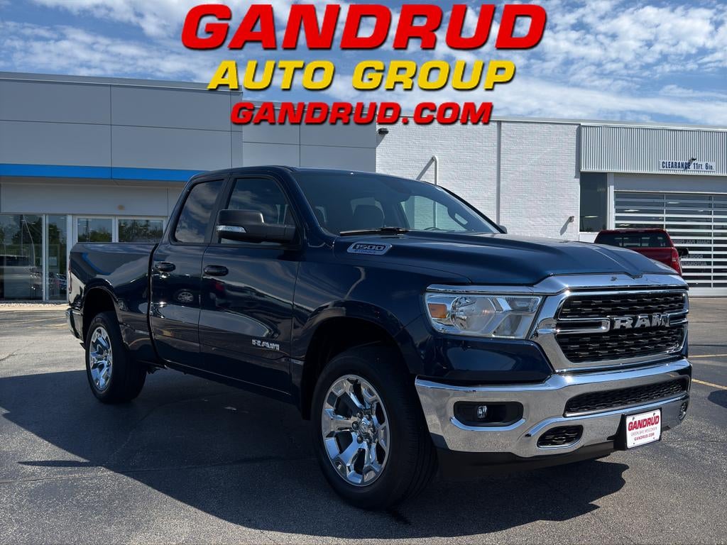 2022 RAM 1500 Big Horn Quad Cab 4x4 6'4" Box in Blue — front three-quarter view