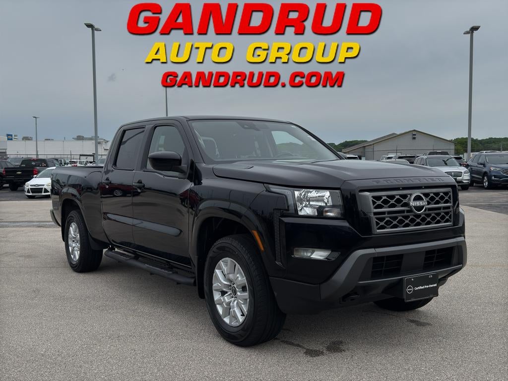 2023 Nissan Frontier Crew Cab Long Bed SV 4x4 in Black — front three-quarter view