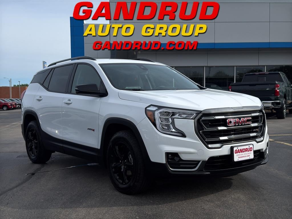 2023 GMC Terrain AT4 in Summit White — front three-quarter view