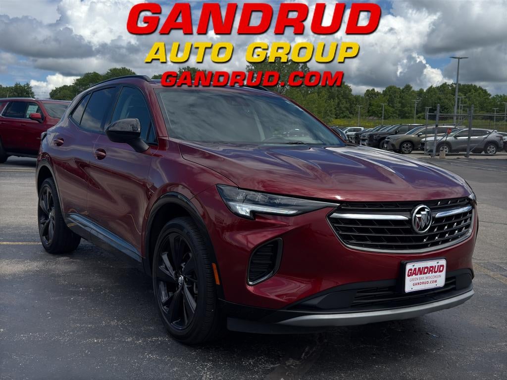 2023 Buick Envision Preferred in Cinnabar Metallic — front three-quarter view